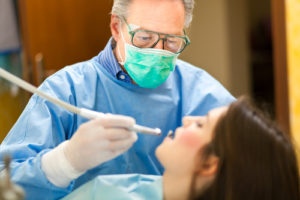 woman getting work done at the dentist